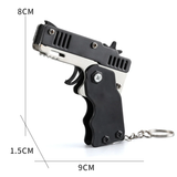 1pc Mini Toy Metal Gun with Rubber Band Fun Folding Pistol Key Charm Pendant Kids Birthday Gifts Toys Boy Girl Game Party Favors